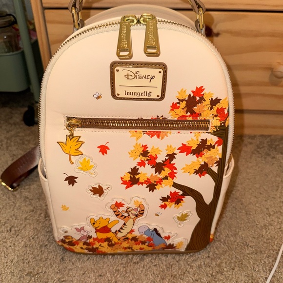 Loungefly Handbags - Loungefly Disney Cream Backpack with Autumn Leaves